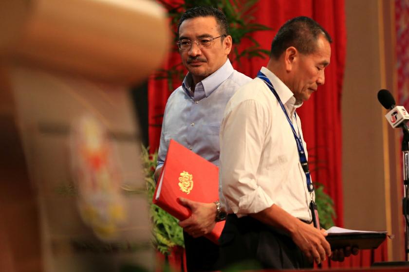 Datuk Seri Hishammuddin Hussein at the daily MH370 press conference at the PWTC in Kuala Lumpur, on March 28, 2014. u00e2u20acu201d Picture by Saw Siow Feng