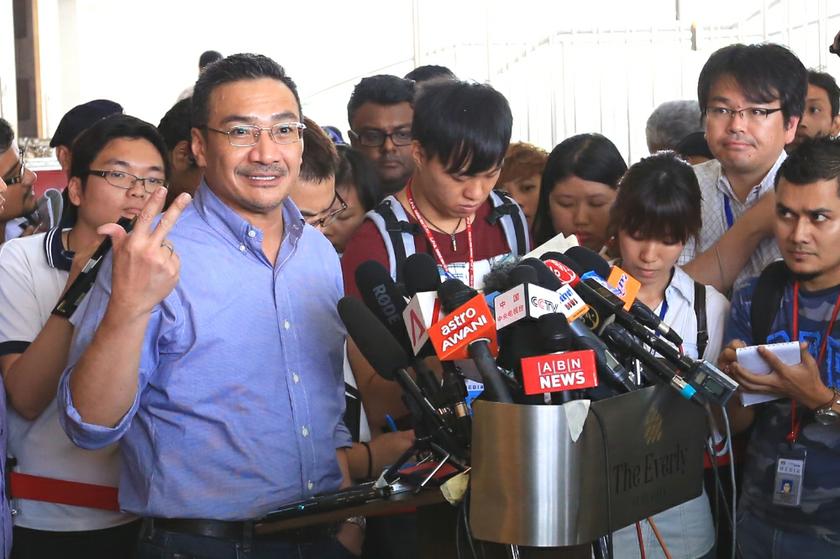 Acting Transport Minister Datuk Seri Hishammuddin Hussein speaks to the media during a visit to the family members of passengers on board flight MH370 at Everly Hotel, Putrajaya, March 29, 2014. u00e2u20acu2022 Picture by Saw Siow Feng