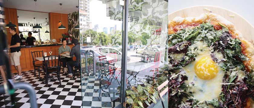 The Soda Factory is styled like a 1950s diner with the twist of a rainforest-themed décor (left). This simple Fiorentina sourdough pizza is topped with spinach, olives, garlic, tomato sauce and Parmesan cheese with a single egg as its bull’s-eye (right).