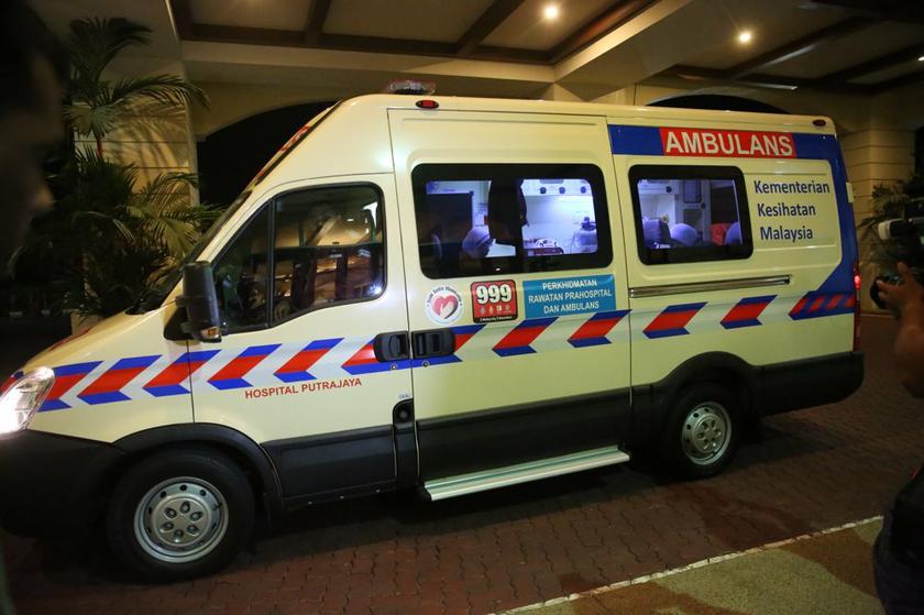 An ambulance was sent to Hotel Bangi in Putrajaya where the Chinese families of MH370 passengers are staying. — Pictures by Choo Choy May