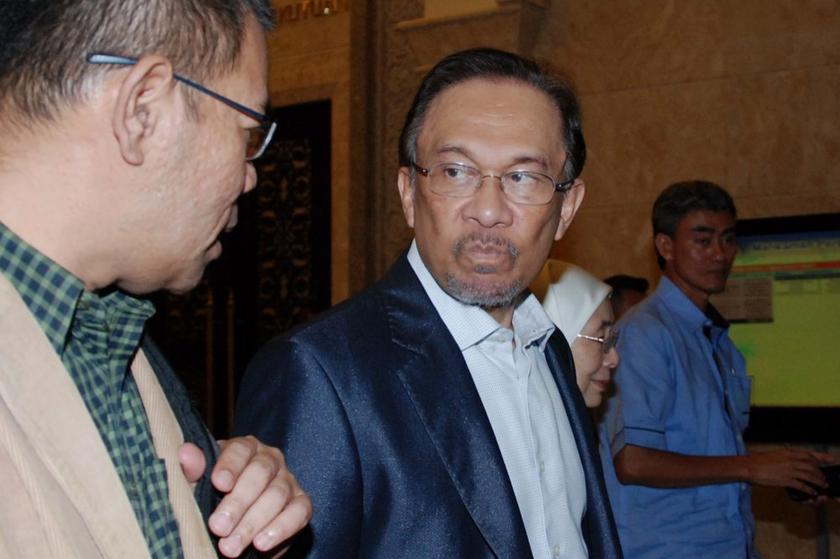 Datuk Seri Anwar Ibrahim leaves the Court of Appeal after the first day of trial in Putrajaya, March 6, 2014. u00e2u20acu201d Picture by Mohd Yusof Mat Isa