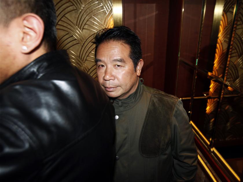 Birmingham City owner Carson Yeung stands in the lift after leaving in the middle of a general meeting at a hotel in Hong Kong February 5, 2014. u00e2u20acu201d Reuters pic