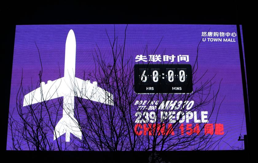 A giant screen shows the number hours since Malaysia Airlines flight MH370 went missing, in Beijing March 10, 2014. u00e2u20acu201d Reuters pic