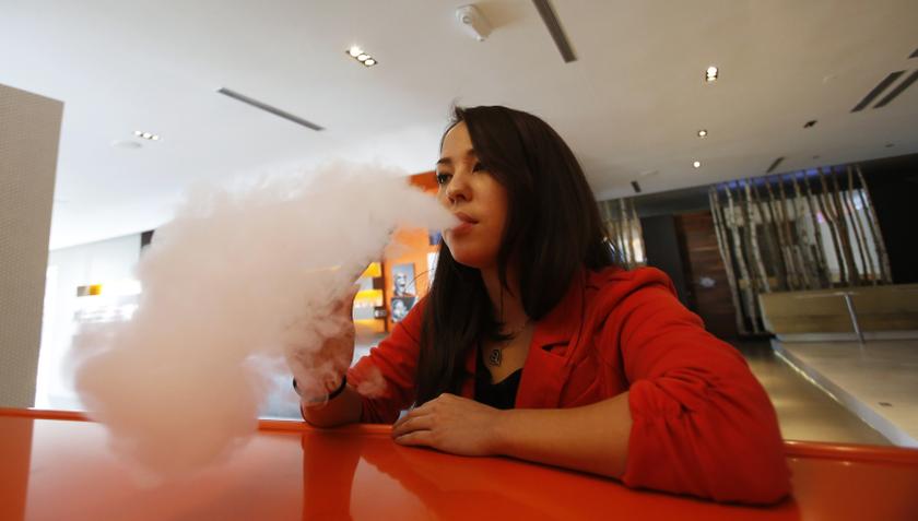 Enthusiast Brandy Tseu uses an electronic cigarette at The Vapor Spot vapor bar in Los Angeles, California March 4, 2014. u00e2u20acu201d Reuters pic