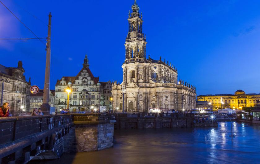 People look at the swollen Elbe river in front of the historic skyline of the east German city of Dresden in this June 5, 2013 file photo. — Reuters pix