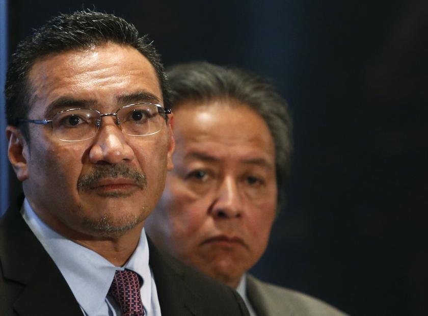 Acting Transport Minister Datuk Seri Hishammuddin Hussein (left) and Foreign Minister Datuk Seri Anifah Aman speak during a news conference at Kuala Lumpur International Airport March 18, 2014. u00e2u20acu201d Reuters pic