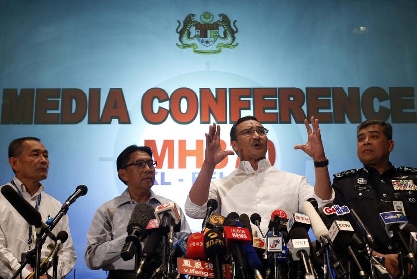 Malaysia's acting Transport Minister Datuk Seri Hishammuddin Hussein (2nd right) speaks during a news conference about the missing Malaysia Airlines flight MH370, at Kuala Lumpur International Airport March 16, 2014.  u00e2u20acu201d Reuters pic