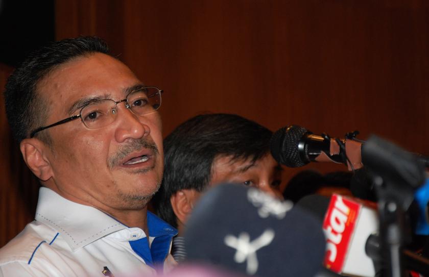 Datuk Seri Hishammuddin Hussein speaks at a news conference at a hotel near the Kuala Lumpur International Airport in Sepang March 9, 2014. u00e2u20acu201d Picture by Mohd Yusof Mat Isa