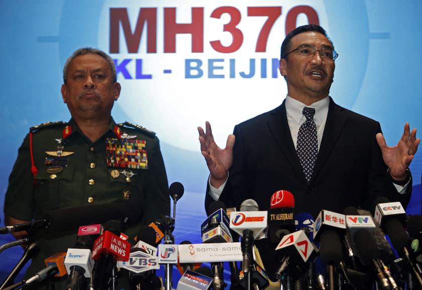 Acting Transport Minister Datuk Seri Hishammuddin Hussein answers questions next to Chief of Armed Forces General Tan Sri Zulkifeli Mohd Zin during a news conference in Sepang March 12, 2014. u00e2u20acu201d Reuters pic