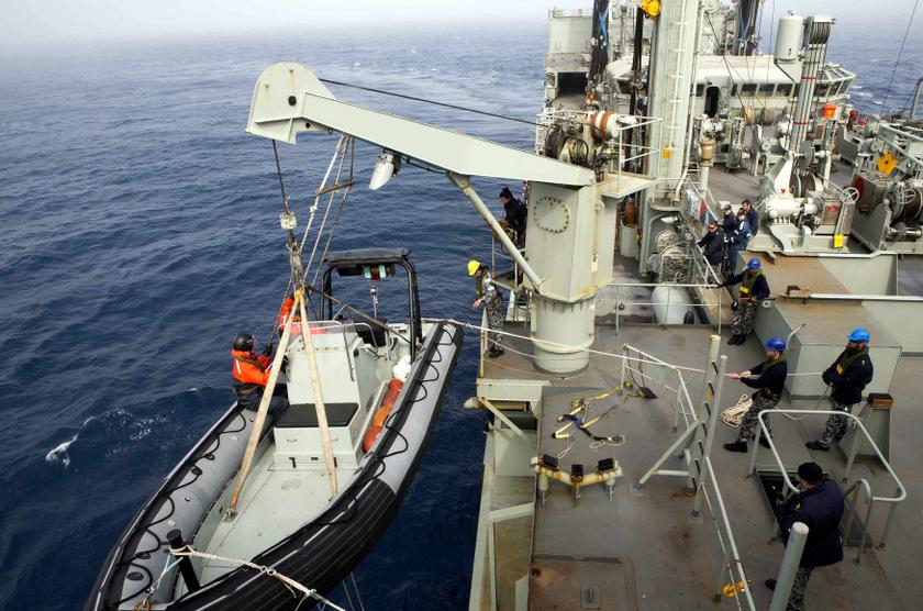 HMAS Success' crew launches a boat to investigate a potential object sighting during the search for flight MH370 in this picture released by the Australian Defence Force March 25, 2014. u00e2u20acu2022 Reuters picn
