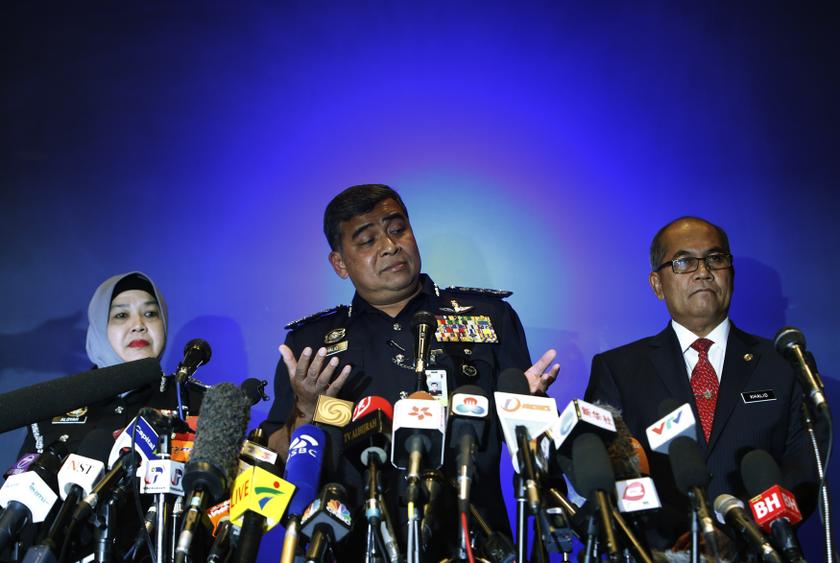 Inspector General of Police Tan Sri Khalid Abu Bakar (centre) addresses a news conference on the two passengers who had travelled onboard the missing MH370 plane on stolen passports in KLIA, on March 11, 2014. u00e2u20acu201d Reuters pic