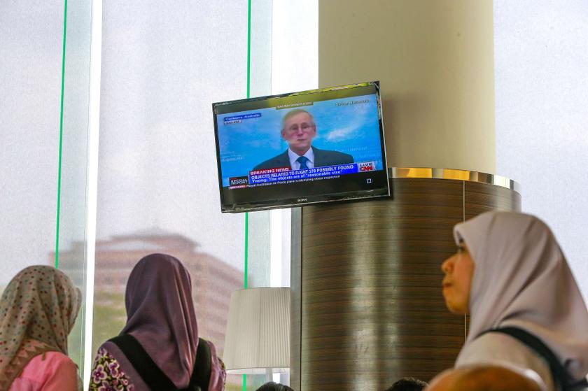 John Young, general manager of the emergency response division of the Australian Maritime Safety Authority (AMSA), shown on TV as he speaks about satellite imagery of debris possibly from Malaysia Airlines flight MH370 in Putrajaya March 20, 2014. u00e2u20acu201d Reu