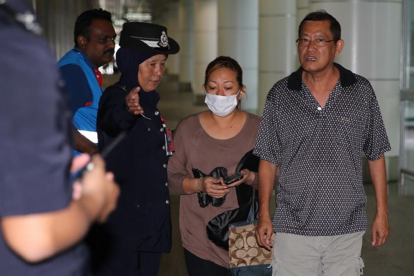 Family members walking into the holding area at Level 5 in KLIA, March 8, 2014. u00e2u20acu201d Picture by Choo Choy May