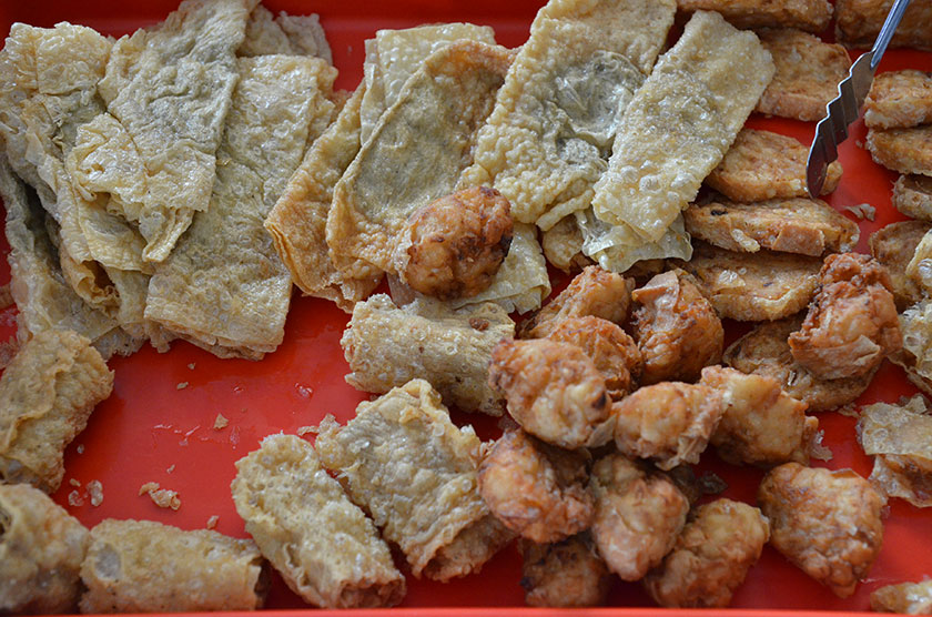 Supplement your meal by choosing from a variety of fried stuffed fish paste items