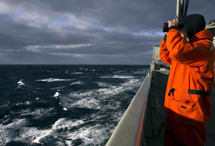 Able Seaman Marine Technician Matthew Oxley stands aboard the Australian Navy ship the HMAS Success looking for debris in the southern Indian Ocean March 31, 2014. u00e2u20acu201d Reuters pic