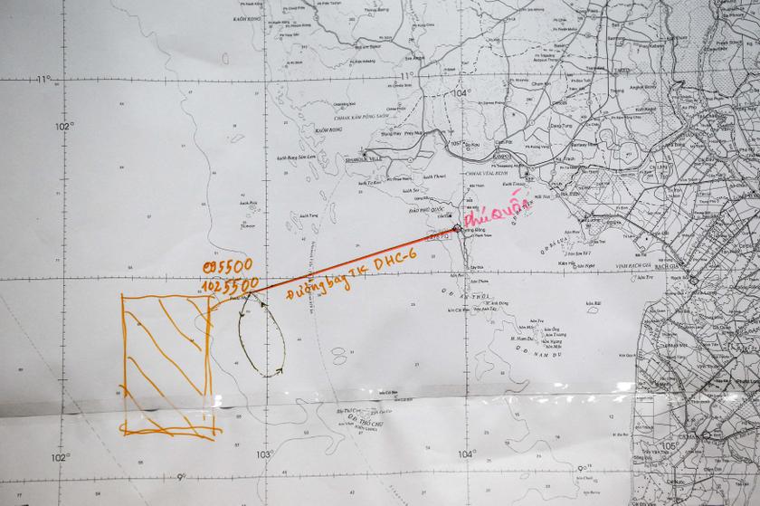A flight route on a map is seen during a news conference about the search and rescue operation to find the missing Malaysia Airlines flight MH370 at Phu Quoc Airport on Phu Quoc Island, March 12, 2014. u00e2u20acu201d Reuters pic