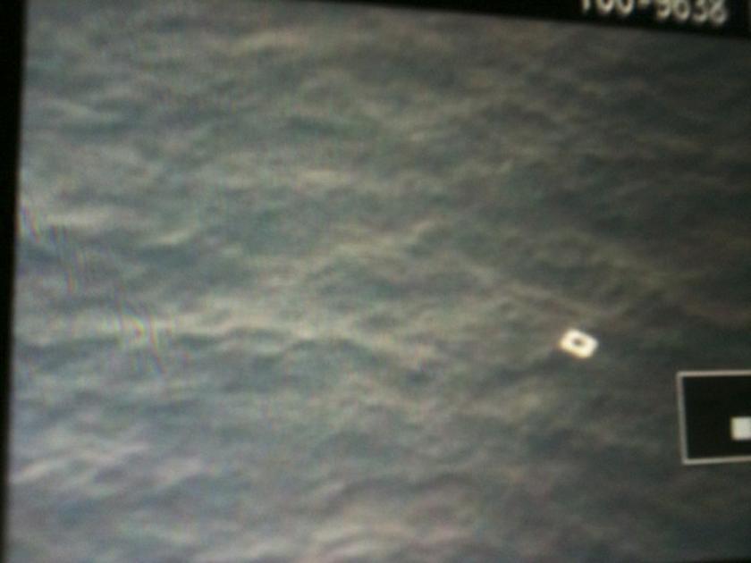 An object is seen floating in the sea on the display of a Vietnamese search airplaneu00e2u20acu2122s camera in this March 9, 2014 handout photograph. u00e2u20acu201d Reuters pic
