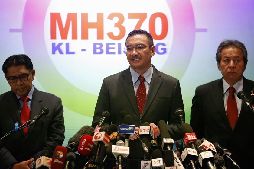 Malaysia's acting Transport Minister Datuk Seri Hishammuddin Hussein (centre) addresses reporters about the missing Malaysia Airlines flight MH370, at Kuala Lumpur International Airport March 20, 2014. u00e2u20acu201d Reuters pic