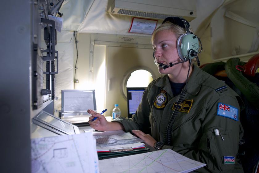 Royal Australian Air Force Navigation and Communications Officer, Flying Officer Brittany Sharpe from 10 Squadron, coordinates all communications between her AP-3C Orion and other aircraft involved in the search for missing Malaysian Airlines flight MH370