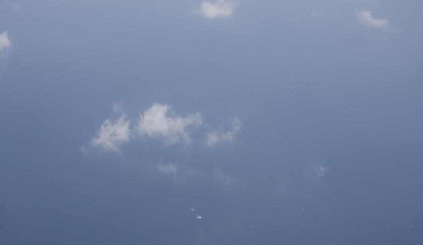 Unidentified search and rescue ships are seen, from an AN-26 aircraft from the Vietnamese airforce, during a mission to find the missing Malaysia Airlines flight MH370 off Tho Chu islands March 11, 2014. u00e2u20acu201d Reuters pic