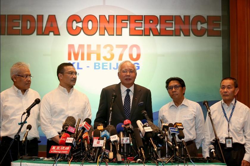 Prime Minister Datuk Seri Najib Razak (centre) said today that the missing Malaysia Airlines flight MH370 may be between two possible corridors that span from Kazakhstan to Thailand in one and Indonesia to the south of the Indian Ocean in the other. u00e2u20acu2022 P
