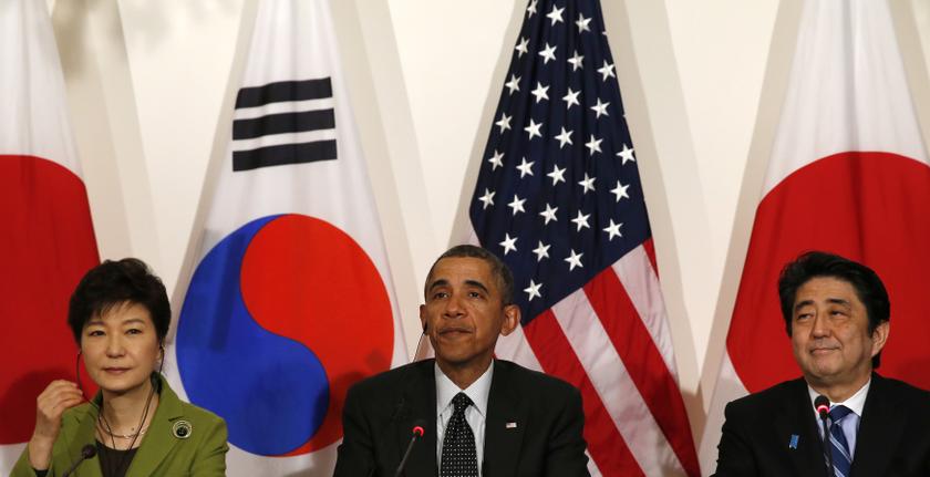 US President Barack Obama holds a tri-lateral meeting with President Park Geun-hye of the South Korea (left) and Prime Minister Shinzo Abe of Japan (right) after the Nuclear Security Summit in The Hague March 25, 2014. — Reuters pic