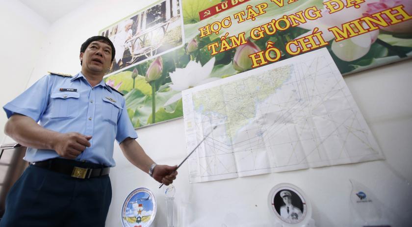 Vietnam's Air Force Deputy Chief of Staff Senior Colonel Do Duc Minh points to the map of a search area to find the missing Malaysia Airlines flight MH370, during a news briefing at a military airport in Ho Chi Minh city March 13, 2014. u00e2u20acu201du00c2u00a0Reuters pic