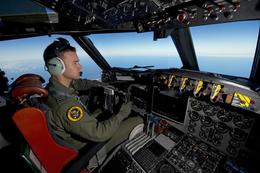 A Royal Australian Air Force pilot steers his AP-3C Orion over the Southern Indian Ocean during the search for missing Malaysian Airlines flight MH370 in this picture released by the Australian Defence Force March 20, 2014. u00e2u20acu201d Reuters pic