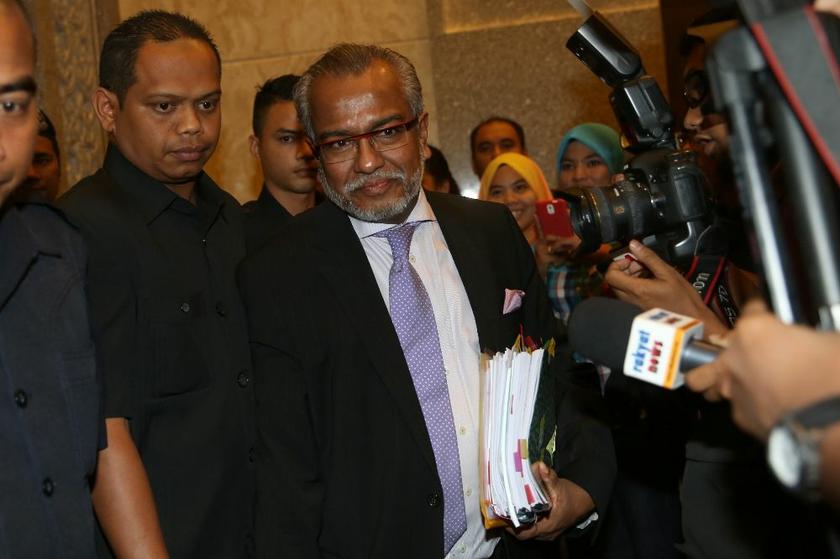 The governmentu00e2u20acu2122s lawyer Tan Sri Muhammad Shafee Abdullah arriving at the court for the Sodomy II trial on March 6, 2014. u00e2u20acu201d Picture by Saw Siow Feng