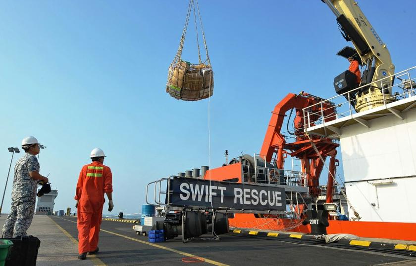 The Singaporean submarine support and rescue vessel, MV Swift Rescue, is prepared before it departs to assist in the search for missing Malaysian Airlines flight MH370 in Singapore, in this March 9, 2014 handout picture. — Reuters pic