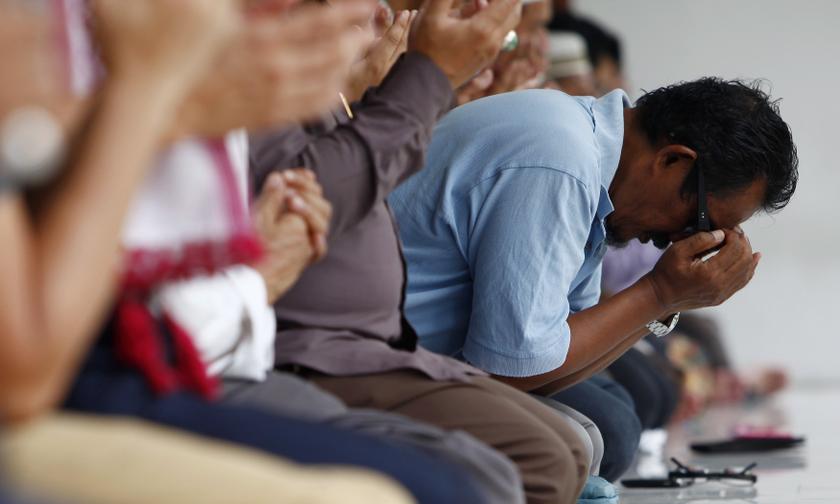 A Malaysian Muslim performs a special prayer for passengers onboard the missing Malaysia Airlines Flight MH370 after Friday prayers in Kuala Lumpur March 14, 2014. u00e2u20acu201d Reuters pic