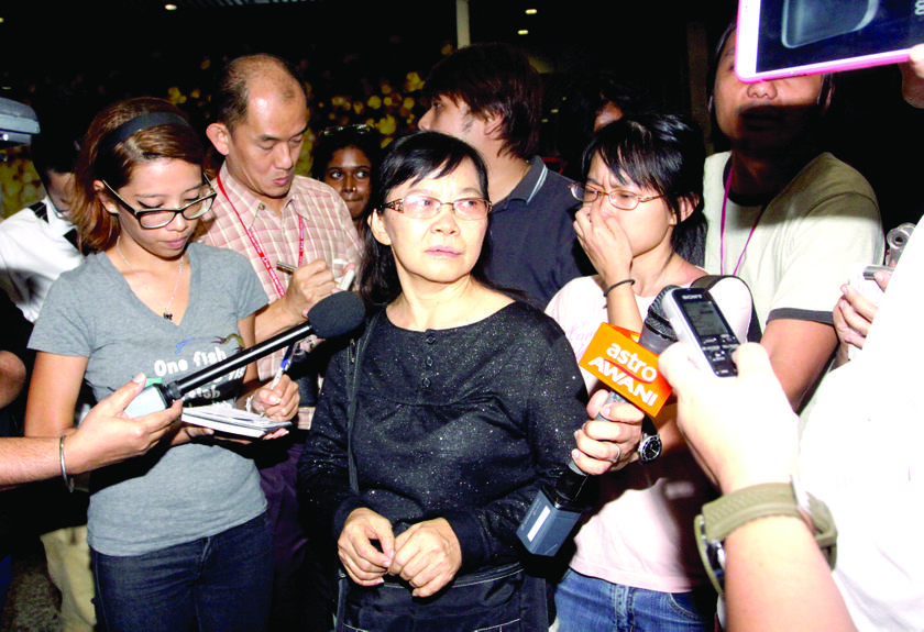 Tan Ku Leng said her husband, Stanley Wong Sai Sang, was not supposed to be on Flight MH370. — Picture by The Malay Mail