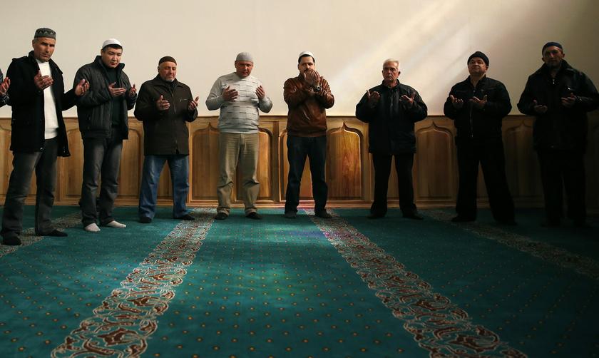 Crimean Tatars attend a Friday prayer at the mosque in Bakhchisaray March 14, 2014. u00e2u20acu201d Reuters pic