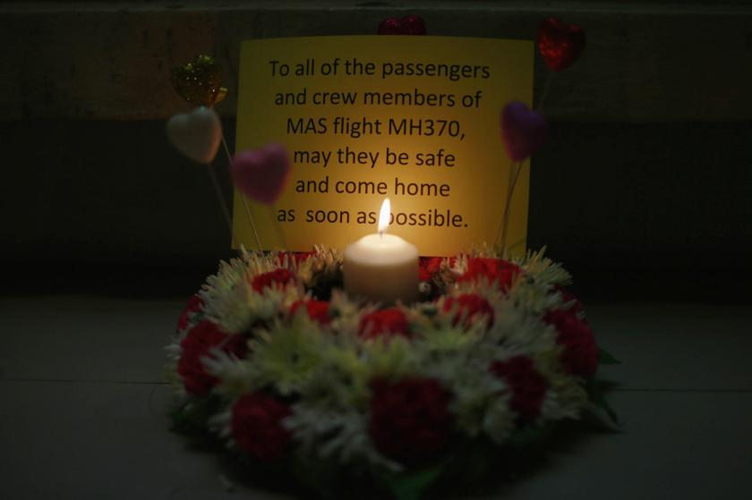 A tribute to the passengers and crew onboard the missing Malaysia Airlines flight MH370 nis seen inside a Buddhist temple in Kuala Lumpur March 12, 2014. u00e2u20acu201d Reuters pic