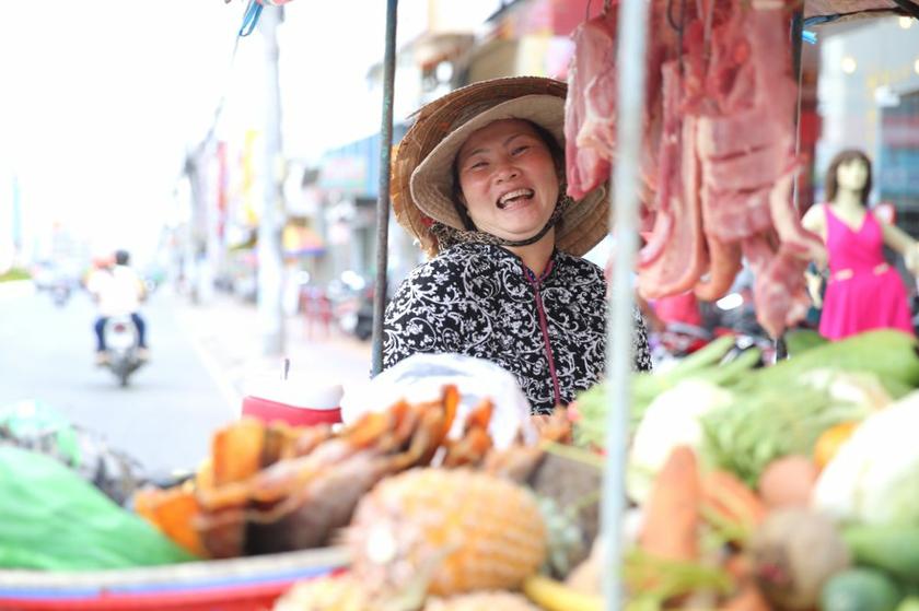 A woman selling meat in Ca Mau, Vietnam’s southernmost province.