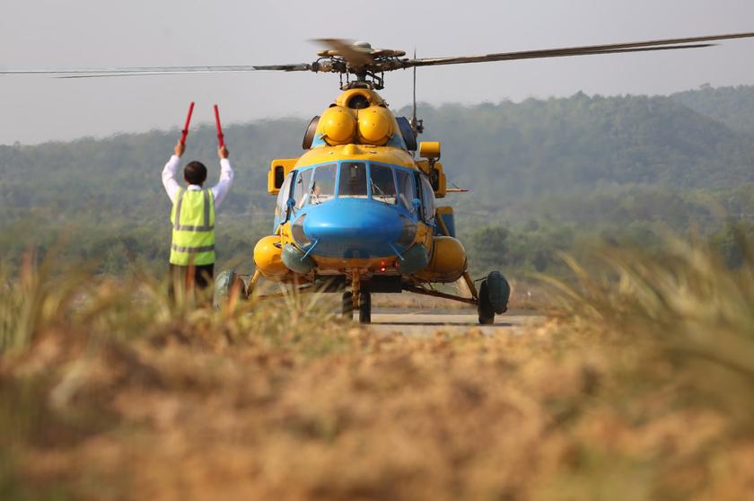 A helicopter lands after coming back from a search for the missing MH370 aircraft at Phu Quoc airport, on March 11, 2014. u00e2u20acu201d Picture by Choo Choy May