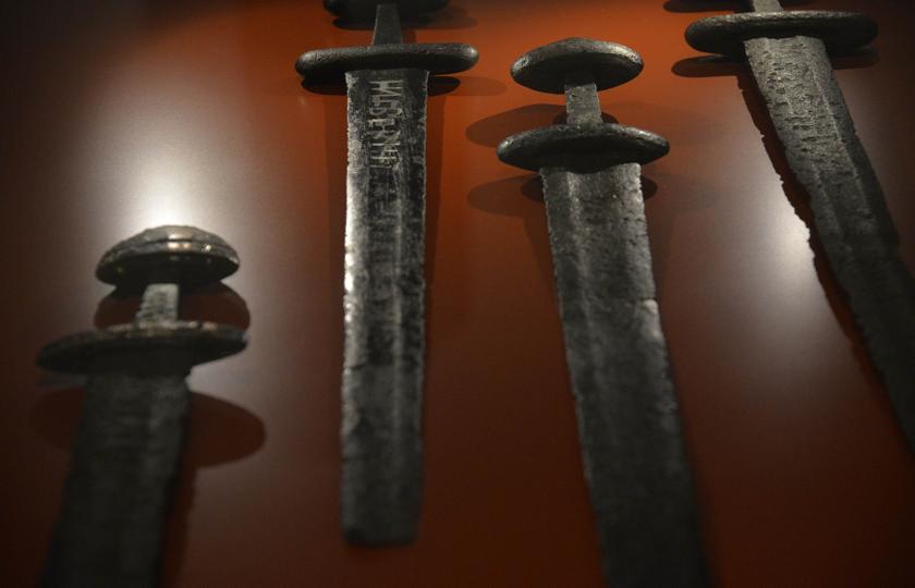 The maker’s name is seen inscribed on one of several German and Scandinavian iron swords dating from the 10th century at the British Museum in London March 4, 2014. — Reuters pic