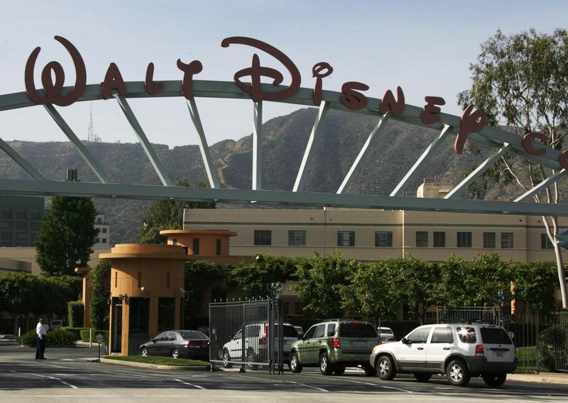 The main gate of the Walt Disney Co is pictured in Burbank, California May 5, 2009. The entertainment giant has signed an agreement with Shanghai Media Group Pictures to develop Disney-branded movies. u00e2u20acu201d Reuters pic