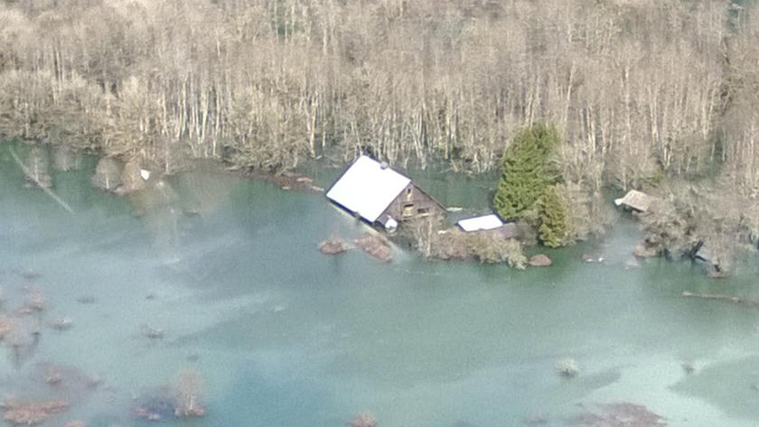 An aerial view of the area affected by a landslide near State Route 530 is seen in this handout photo provided by the Governor Jay Inslee's office taken near Oso, Washington March 23, 2014. — Reuters pic