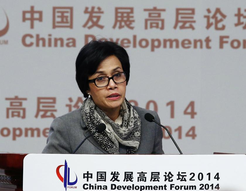 World Bank Managing Director Sri Mulyani Indrawati makes a speech during China Development Forum in Beijing March 23, 2014. u00e2u20acu201d Reuters pic