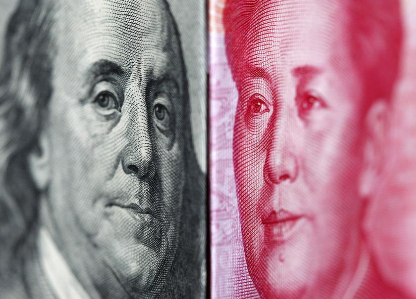 A 100 yuan banknote is placed beside a US 100 dollar banknote in this June 20, 2010 file picture illustration taken in Taipei. u00e2u20acu201d Reuters pic