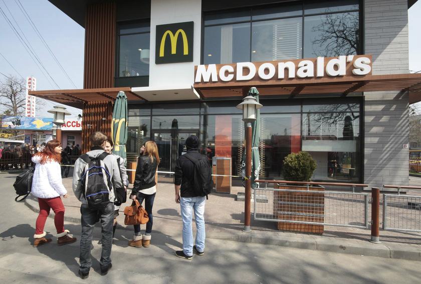 People gather outside a McDonaldu00e2u20acu2122s restaurant, which was earlier closed for clients, in the Crimean city of Simferopol, April 7, 2014. u00e2u20acu2022 Reuters pic