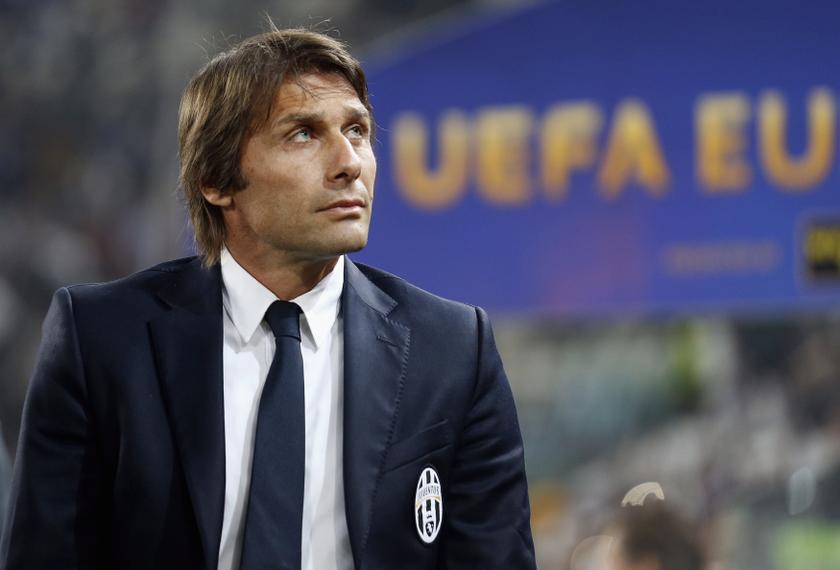 Juventus coach Antonio Conte looks on before the second leg of their Europa League quarter-final soccer match against Olympique Lyon at the Olympic stadium in Turin April 10, 2014. u00e2u20acu201d Reuters pic