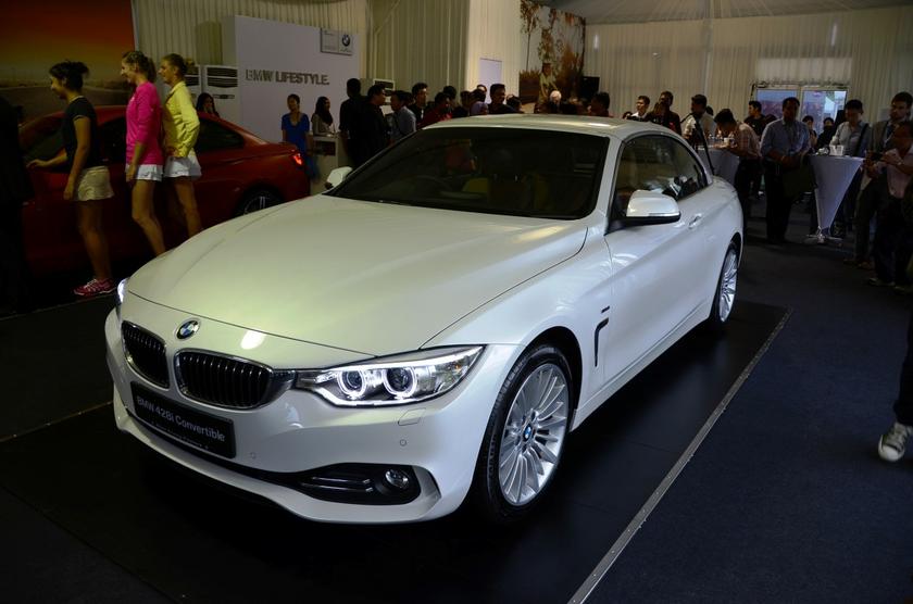The BMW 4 Series Convertible is built on an extended 3 Series platform and comes with a higher tuned 2.0 litre turbocharged engine found in the 328i sedan. ― Picture by YS Khong