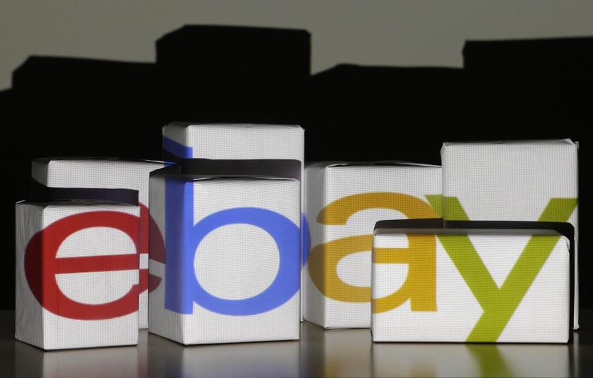 An eBay logo is projected onto white boxes in this illustration picture taken in Warsaw, January 21, 2014 Reuters