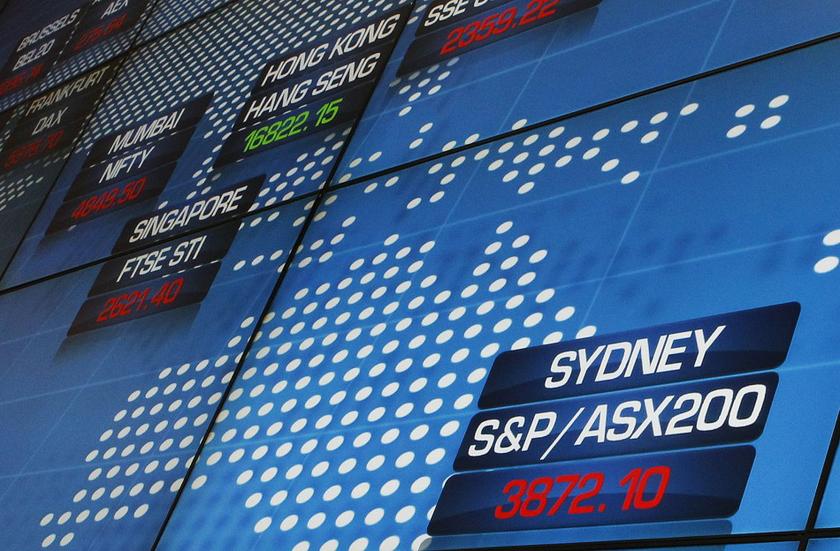 The main indicator of the Australian Securities Exchange (bottom R) shortly after the market opened in central Sydney October 4, 2011 Reuters