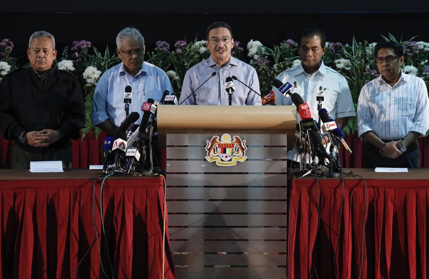 Malaysiau00e2u20acu2122s Defence Minister and acting Transport Minister Hishammuddin Hussein (centre) speaks at a news conference at the Putra World Trade Centre (PWTC) in Kuala Lumpur April 5, 2014. u00e2u20acu201d Reuters pic