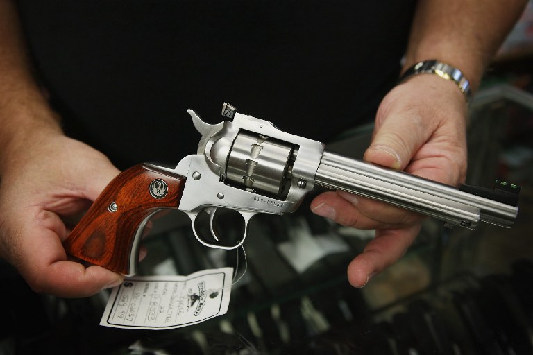 File photo shows a Ruger revolver being offered for sale in a gun shop in Illinois. A US homeowner shot and killed a German high school exchange student he suspected of breaking into his garage. u00e2u20acu201d AFP pic