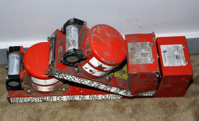 A file photo taken on May 13, 2010 shows the recovered black boxes of the Libyan Afriqiyah Airways plane that crashed on 12 May 2010. Black boxes, which record all in-flight data in aircraft, are essential tools in air accident investigations. — AFP pic
