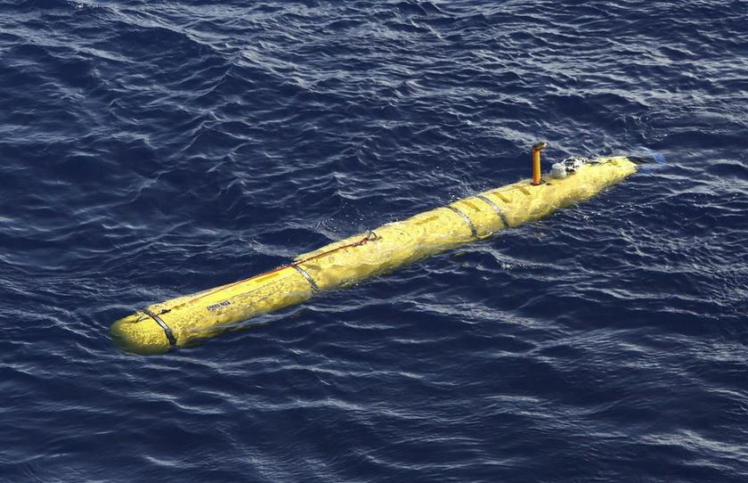 The Bluefin-21 Autonomous Underwater Vehicle sits in the water after being deployed from the Australian Defence Vessel Ocean Shield in the southern Indian Ocean during the continuing search for the missing Malaysian Airlines flight MH370 April 17, 2014. u00e2
